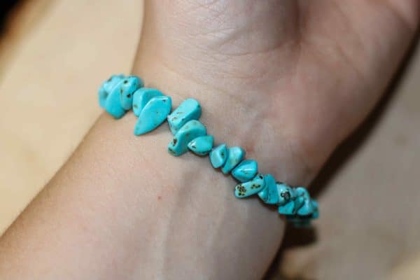 Bracelet élastique femme Kenzo bois et perles turquoise ✔️